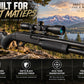 TRINITY black 4x32 optical scope with adjustable turrets, mounting rings, protective support bars and multi-coated objective lens on a white background.