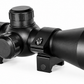 TRINITY black 4x32 optical scope with adjustable turrets, mounting rings, protective support bars and multi-coated objective lens on a white background.