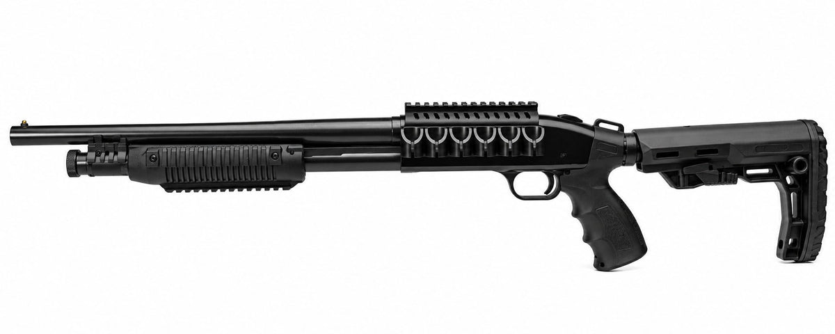 A black tactical shotgun with an integrated vertical foregrip, a top-mounted rail system with multiple interchangeable magazine holders, a textured forend, and a folding stock, shown against a plain white background.