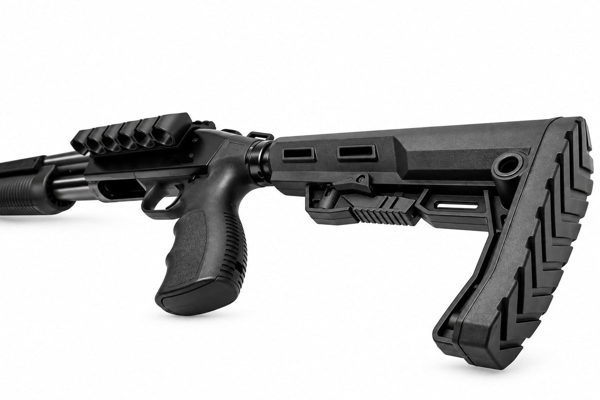 A black tactical shotgun with a textured, rugged stock and a mounted rail system, shown from a side profile on a white background.
