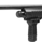 Close-up of a black tactical shotgun or rifle stock with a vertical foregrip and a mounted optic, shown against a plain white background.