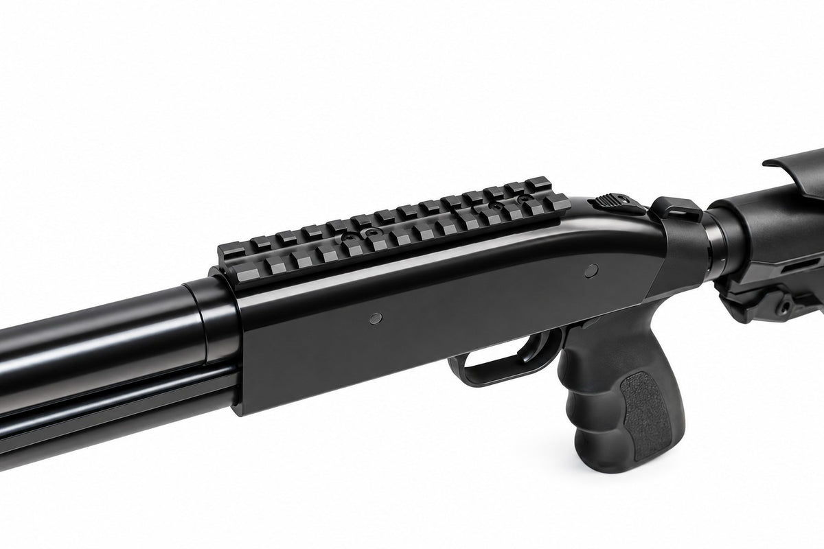 Close-up of a black shotgun on a white background