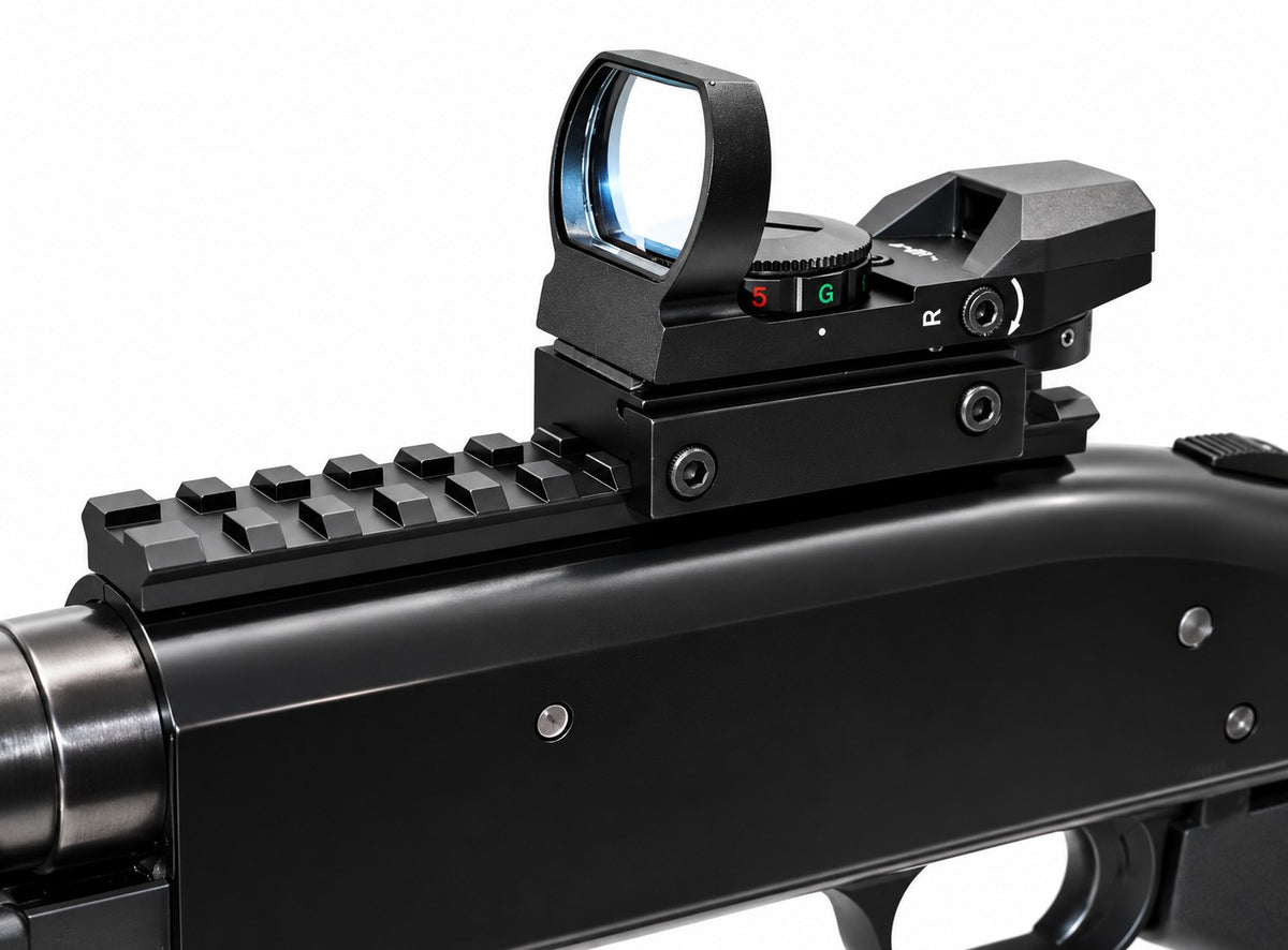 A black tactical red dot sight mounted on a black rifle receiver, shown in a close-up studio shot against a white background.