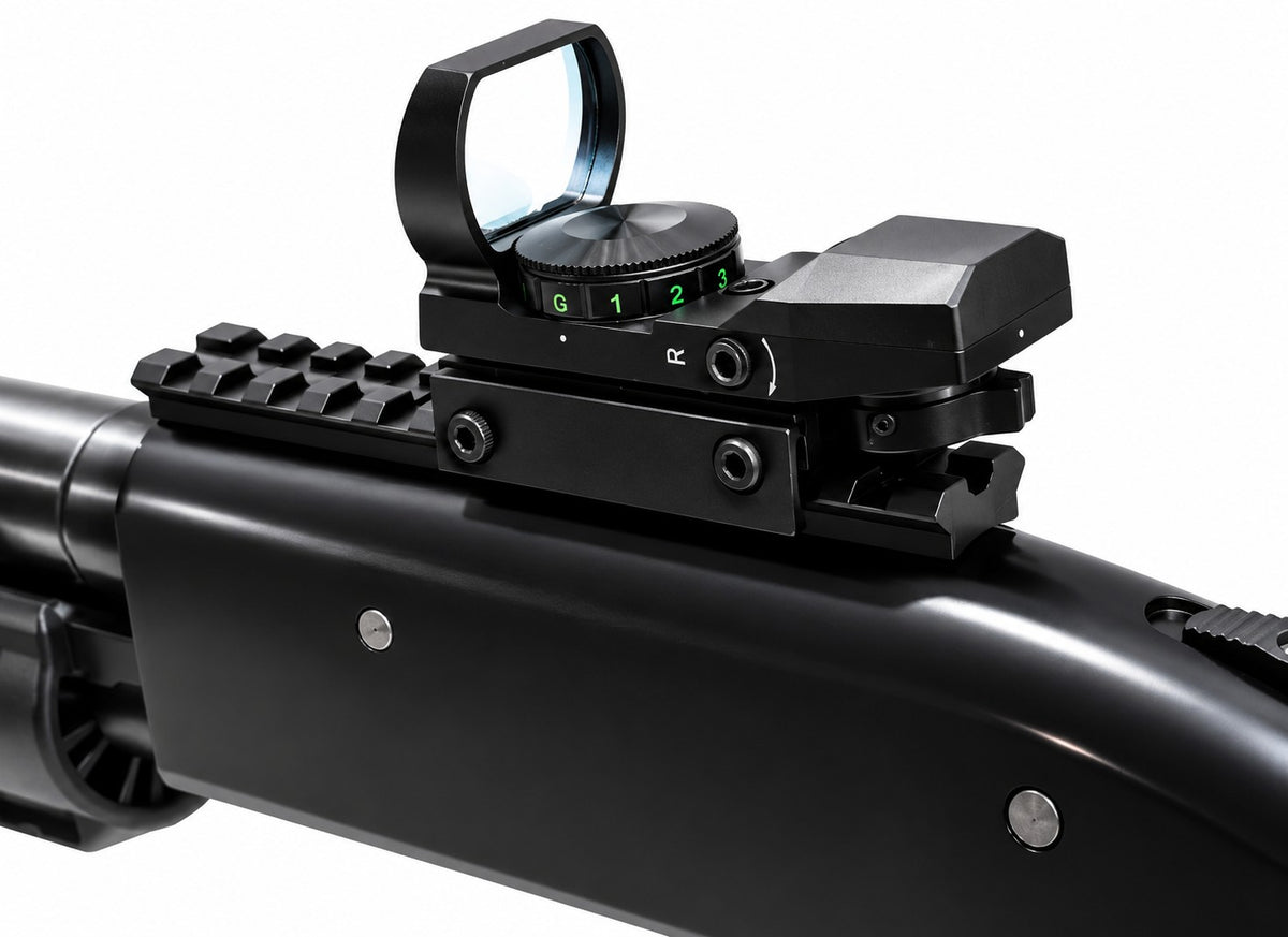A close-up studio shot of a black tactical rifle scope mounted on a black firearm receiver, shown against a plain white background.