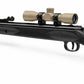 TRINITY 4x32 Mil-Dot scope in tan with blue multi-coated objective lens, aluminum housing, adjustment turrets, and black dovetail mounting rings on a white background.