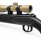 TRINITY 4x32 Mil-Dot scope in tan with blue multi-coated objective lens, aluminum housing, adjustment turrets, and black dovetail mounting rings on a white background.