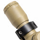 TRINITY 4x32 Mil-Dot scope in tan with blue multi-coated objective lens, aluminum housing, adjustment turrets, and black dovetail mounting rings on a white background.