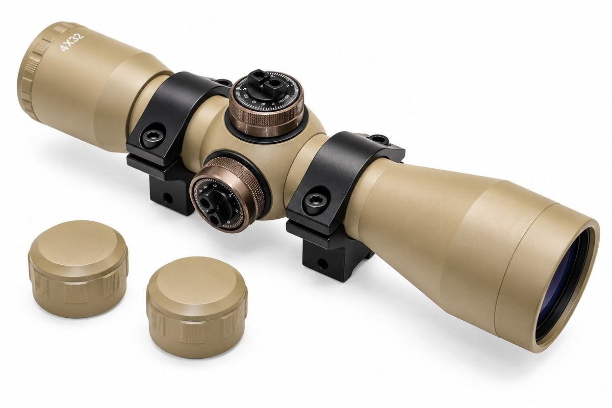 TRINITY 4x32 Mil-Dot scope in tan with blue multi-coated objective lens, aluminum housing, adjustment turrets, and black dovetail mounting rings on a white background.
