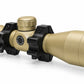 TRINITY 4x32 Mil-Dot scope in tan with blue multi-coated objective lens, aluminum housing, adjustment turrets, and black dovetail mounting rings on a white background.
